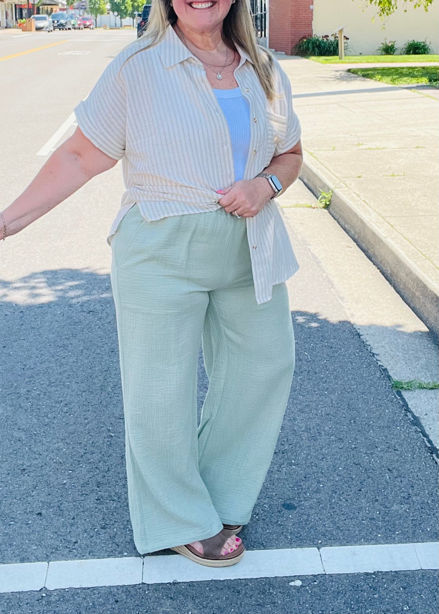 Woman in light-colored linen pants