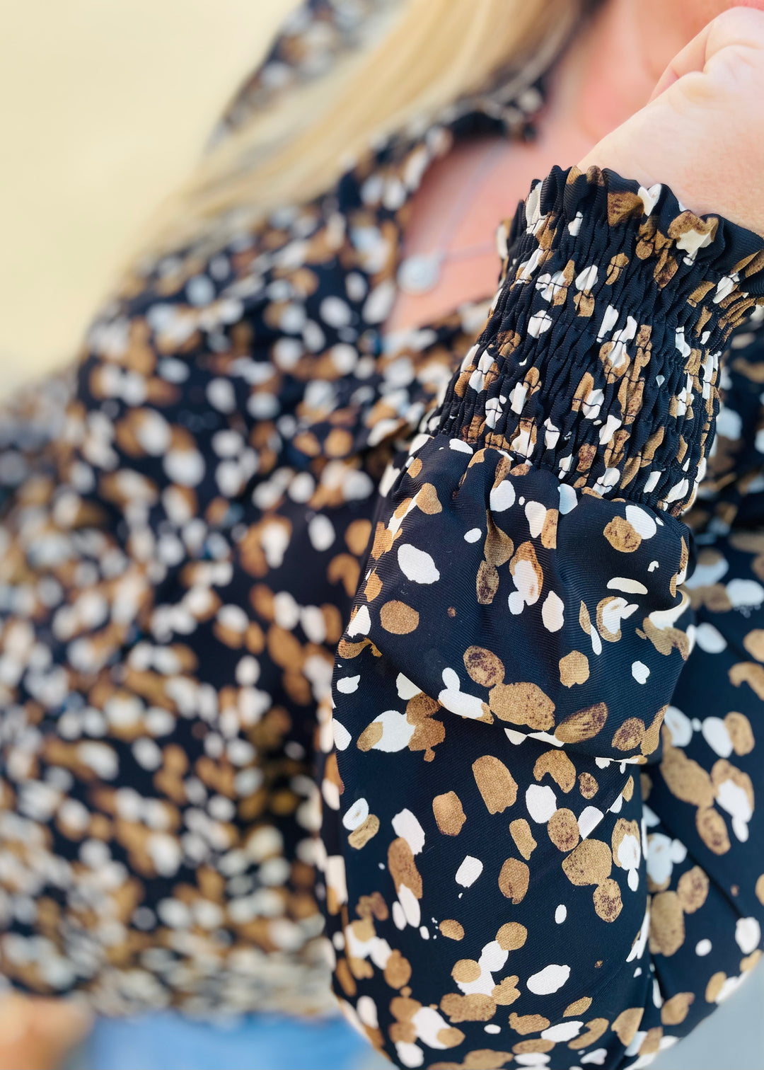 Abstract V-Neck Smocked Cuff Blouse